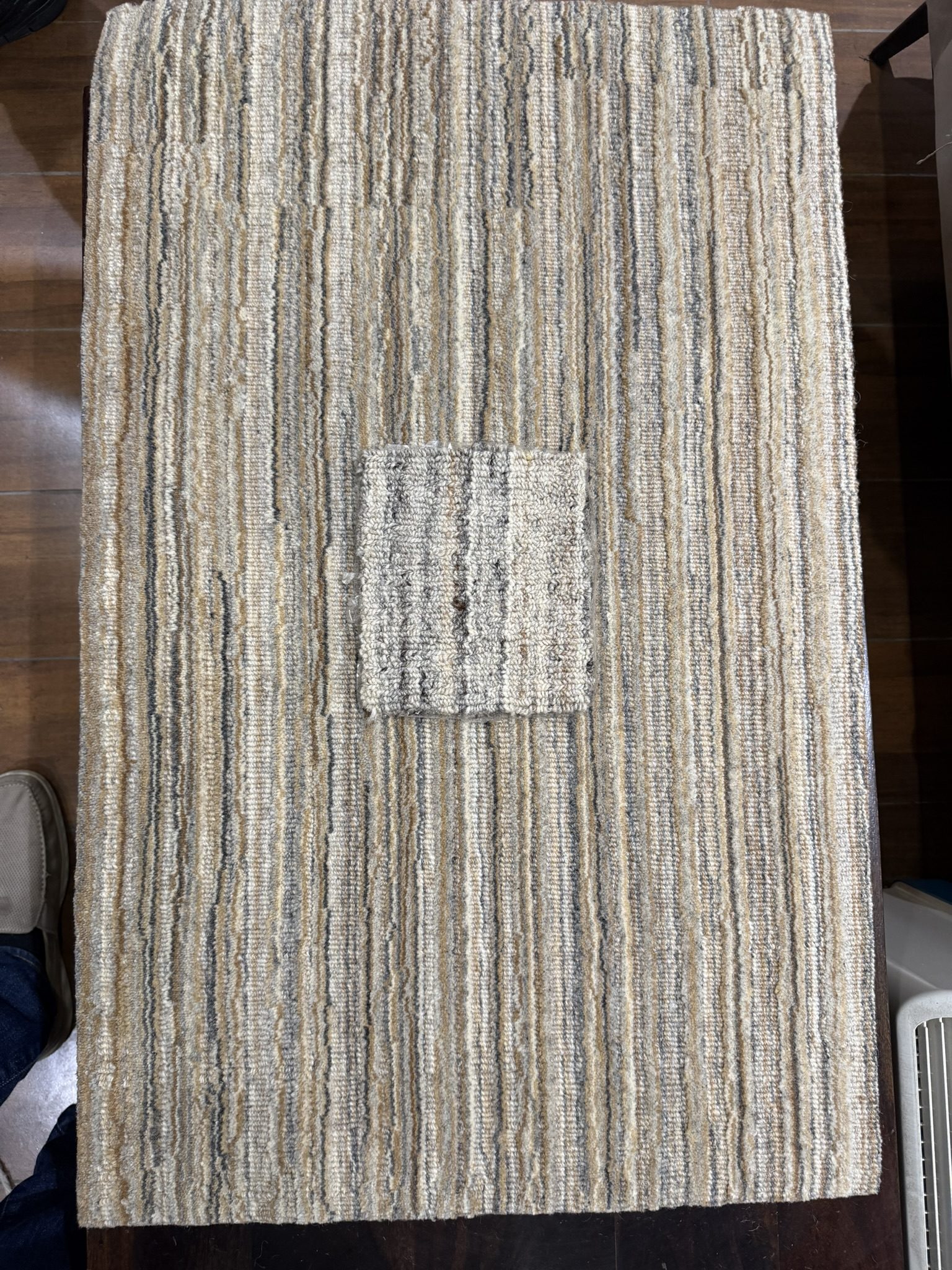 Finished handwoven wool carpet with natural striated texture